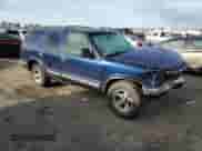 1998 Chevrolet Blazer LS with VIN 1GNCS13W5W2293895, listed as a Copart auction lot 49852655 with Not provided miles and Salvage title. Bid and sale history available at DreamBid. Image 4.