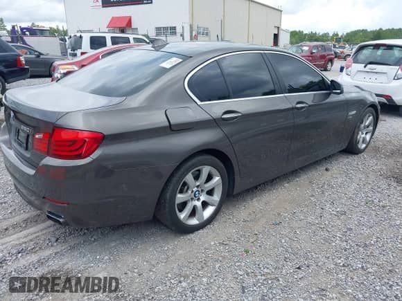 2011 BMW 5 Series 550i xDrive with VIN WBAFU9C50BC784818, listed as a IAAI auction lot 42313290 with 96,348 mi miles and . Bid and sale history available at DreamBid. Image 4.