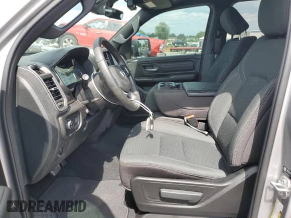 2025 Ram 1500 Tradesman with VIN 1C6RREGG1SN645797, listed as a Copart auction lot 61264645 with 2,386 mi miles and Salvage title. Bid and sale history available at DreamBid. Image 7.