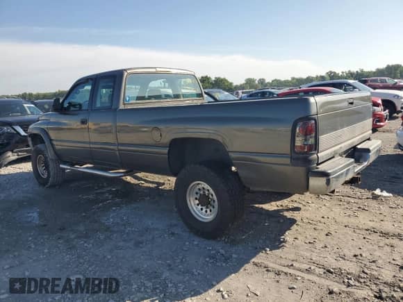 1996 Dodge 2500 with VIN 1B7KF23C1TJ123975, listed as a Copart auction lot 65028055 with 156,028 mi miles and Salvage title. Bid and sale history available at DreamBid. Image 2.