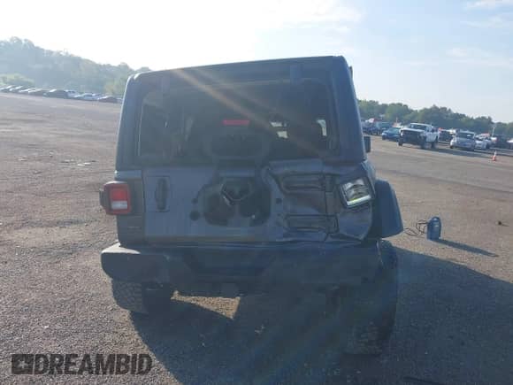 2022 Jeep Wrangler Unlimited Willys z VIN 1C4HJXDM9NW226080, wystawiony jako IAAI lot #43119592 z przebiegiem 59 039 mil mil oraz . Historia ofert i sprzedaży dostępna na DreamBid. Obrazek 16.