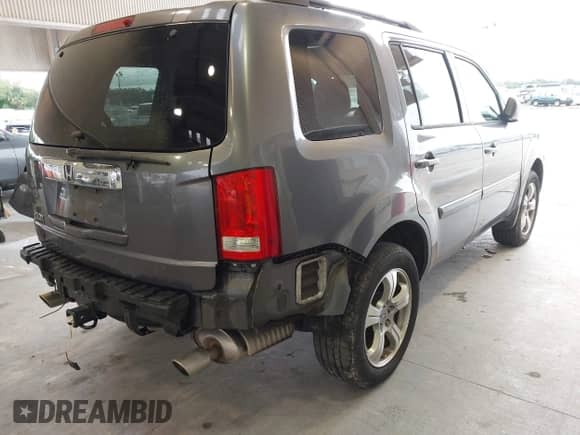 2014 Honda Pilot EX with VIN 5FNYF3H48EB013310, listed as a IAAI auction lot 43411367 with 134,710 mi miles and . Bid and sale history available at DreamBid. Image 4.