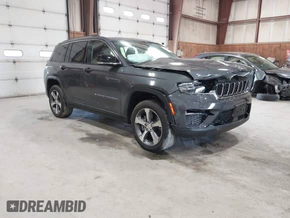 2022 Jeep Grand Cherokee with VIN 1C4RJYB65N8758560, listed as a IAAI auction lot 42182021 with 28,096 mi miles and . Bid and sale history available at DreamBid. Image 1.