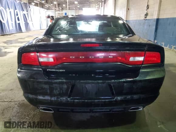 2013 Dodge Charger SE z VIN 2C3CDXBG0DH528454, wystawiony jako Copart lot #84697974 z przebiegiem 217 316 mil mil oraz Szkoda całkowita • Salvage title. Historia ofert i sprzedaży dostępna na DreamBid. Obrazek 6.