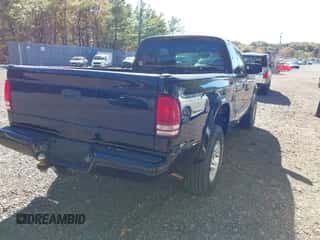 2002 Dodge Dakota Sport with VIN 1B7GG32N12S677909, listed as a IAAI auction lot 43502775 with 140,640 mi miles and . Bid and sale history available at DreamBid. Image 4.