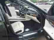 2013 BMW 7 Series 750i xDrive with VIN WBAYB6C50DC998045, listed as a IAAI auction lot 42450110 with 102,068 mi miles and . Bid and sale history available at DreamBid. Image 5.
