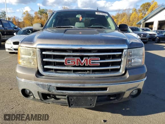 2013 GMC Sierra 1500 SLE z VIN 1GTR2VE7XDZ288664, wystawiony jako Copart lot #89510535 z przebiegiem 165 018 mil mil oraz Czysty tytuł • Clean title. Historia ofert i sprzedaży dostępna na DreamBid. Obrazek 5.