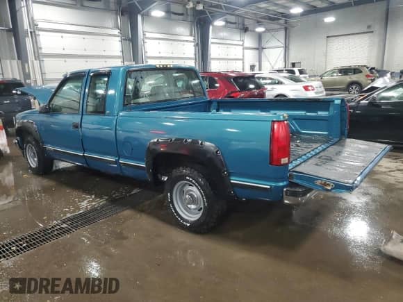 1997 Chevrolet Silverado 1500 with VIN 1GCEC19WXVE216345, listed as a Copart auction lot 82008794 with 167,116 mi miles and Salvage title. Bid and sale history available at DreamBid. Image 2.