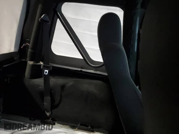 2003 Jeep Wrangler Rubicon с VIN 1J4FA69SX3P322715, выставлен на аукционе Copart как лот 63976635 с пробегом 167 842 миль миль и Списание • Salvage title. История ставок и продаж доступна на DreamBid. Изображение 10.