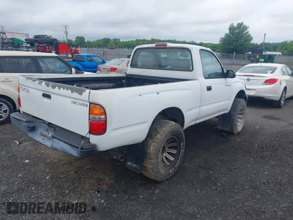 2002 Toyota Tacoma with VIN 5TEPM62N72Z033143, listed as a IAAI auction lot 42181747 with 217,872 mi miles and . Bid and sale history available at DreamBid. Image 4.
