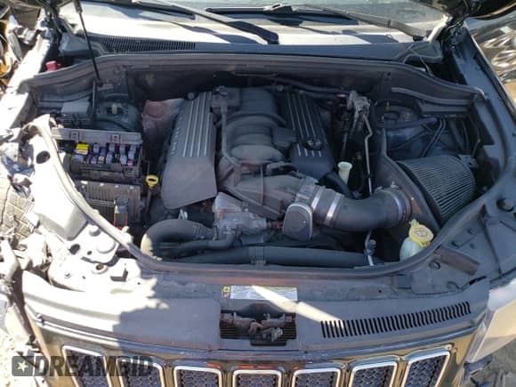 2012 Jeep Grand Cherokee SRT-8 z VIN 1C4RJFDJ2CC352056, wystawiony jako Copart lot #48810994 z przebiegiem 114 807 mil mil oraz Szkoda całkowita • Salvage title. Historia ofert i sprzedaży dostępna na DreamBid. Obrazek 11.