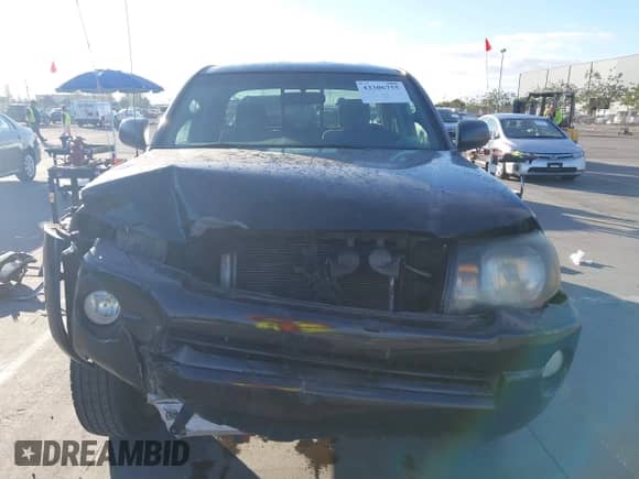 2007 Toyota Tacoma PreRunner z VIN 5TETU62NX7Z388023, wystawiony jako IAAI lot #43306755 z przebiegiem 182 795 mil mil oraz . Historia ofert i sprzedaży dostępna na DreamBid. Obrazek 13.
