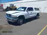 1999 Dodge Dakota SLT z VIN 1B7GG22X8XS301937, wystawiony jako IAAI lot #42628522 z przebiegiem Nie podano mil oraz . Historia ofert i sprzedaży dostępna na DreamBid. Obrazek 16.