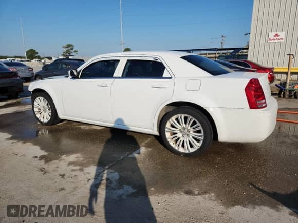 2010 Chrysler 300 S with VIN 2C3CA2CV4AH328326, listed as a Copart auction lot 71128315 with 122,788 mi miles and Salvage title. Bid and sale history available at DreamBid. Image 2.