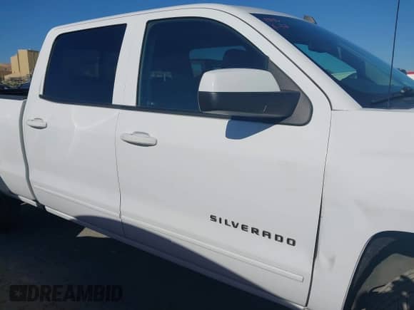 2018 Chevrolet Silverado 1500 LT with VIN 1GCUKRECXJF180945, listed as a IAAI auction lot 42450588 with 108,199 mi miles and . Bid and sale history available at DreamBid. Image 13.