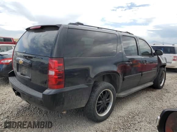 2014 Chevrolet Suburban LT с VIN 1GNSKJE79ER208905, выставлен на аукционе Copart как лот 69752065 с пробегом 105 649 миль миль и Списание • Salvage title. История ставок и продаж доступна на DreamBid. Изображение 3.