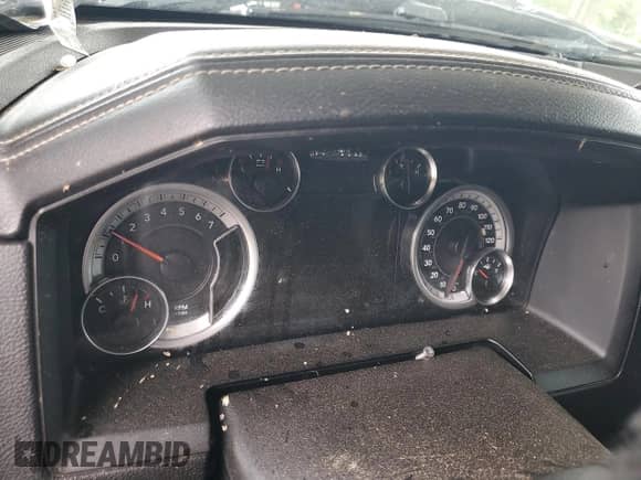 2015 Ram 1500 Laramie z VIN 1C6RR6JT6FS621613, wystawiony jako Copart lot #58815805 z przebiegiem Nie podano mil oraz Szkoda całkowita • Salvage title. Historia ofert i sprzedaży dostępna na DreamBid. Obrazek 9.