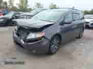 2016 Honda Odyssey Touring Elite с VIN 5FNRL5H94GB058168, выставлен на аукционе IAAI как лот 43302272 с пробегом 233 057 миль миль и . История ставок и продаж доступна на DreamBid. Изображение 2.