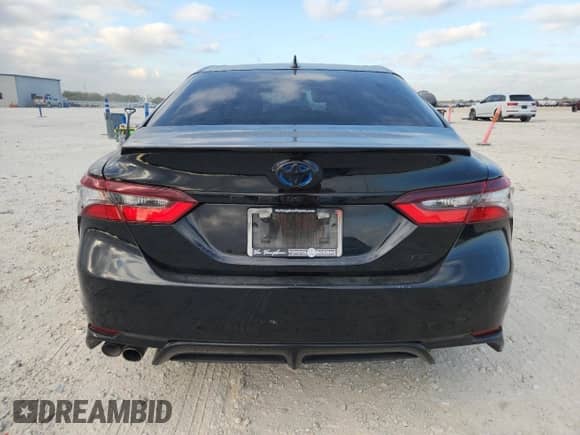 2023 Toyota Camry Hybrid SE with VIN 4T1T31AK4PU047945, listed as a Copart auction lot 86823265 with 58,221 mi miles and Salvage title. Bid and sale history available at DreamBid. Image 6.