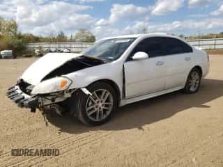 2013 Chevrolet Impala LTZ with VIN 2G1WC5E38D1243768, listed as a Copart auction lot 82187085 with 124,650 mi miles and Salvage title. Bid and sale history available at DreamBid. Image 1.