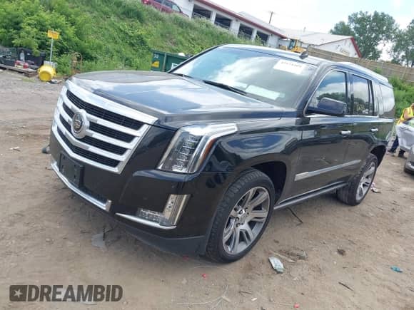 2015 Cadillac Escalade Premium z VIN 1GYS4CKJ9FR254258, wystawiony jako IAAI lot #42574409 z przebiegiem 129 511 mil mil oraz . Historia ofert i sprzedaży dostępna na DreamBid. Obrazek 2.