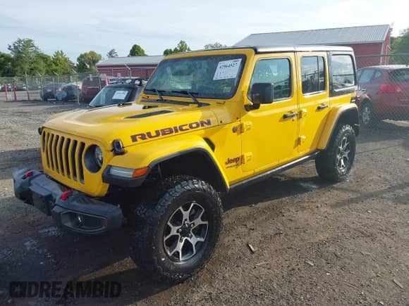 2021 Jeep Wrangler Unlimited Rubicon with VIN 1C4JJXFM0MW520156, listed as a IAAI auction lot 42964527 with 24,778 mi miles and . Bid and sale history available at DreamBid. Image 2.