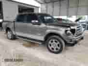 2013 Ford F-150 Lariat with VIN 1FTFW1ET2DFC87796, listed as a Copart auction lot 71112565 with 207,394 mi miles and Salvage title. Bid and sale history available at DreamBid. Image 4.