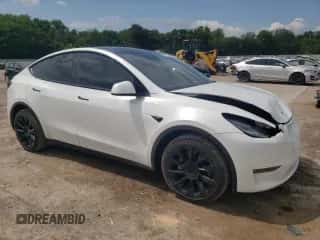 2021 Tesla Model Y Long Range with VIN 5YJYGDEE5MF111550, listed as a Copart auction lot 61527244 with 56,419 mi miles and Salvage title. Bid and sale history available at DreamBid. Image 4.