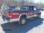 2003 Dodge Dakota SLT z VIN 1D7HG42N33S369870, wystawiony jako IAAI lot #41826771 z przebiegiem 214 840 mil mil oraz . Historia ofert i sprzedaży dostępna na DreamBid. Obrazek 4.