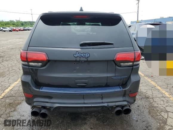 2018 Jeep Grand Cherokee Trackhawk z VIN 1C4RJFN92JC318555, wystawiony jako Copart lot #60436545 z przebiegiem 58 628 mil mil oraz Czysty tytuł • Clean title. Historia ofert i sprzedaży dostępna na DreamBid. Obrazek 6.