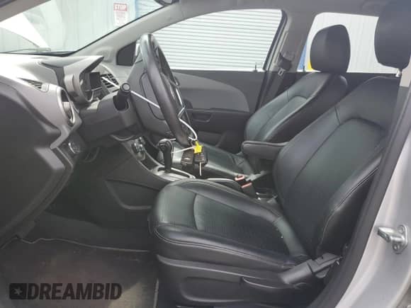 2014 Chevrolet Sonic LTZ с VIN 1G1JE6SB5E4131294, выставлен на аукционе Copart как лот 80164615 с пробегом 69 644 миль миль и Списание • Salvage title. История ставок и продаж доступна на DreamBid. Изображение 7.