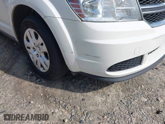 2015 Dodge Journey American Value z VIN 3C4PDCAB8FT605870, wystawiony jako IAAI lot #41930474 z przebiegiem 205 741 mil mil oraz . Historia ofert i sprzedaży dostępna na DreamBid. Obrazek 6.