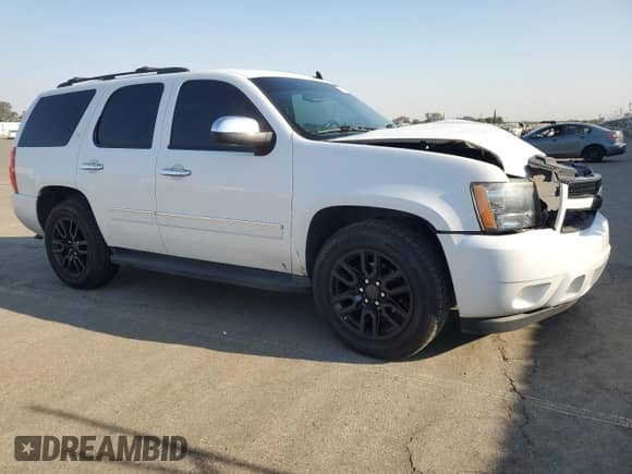 2013 Chevrolet Tahoe LTZ with VIN 1GNSKCE00DR315063, listed as a Copart auction lot 71993685 with 213,947 mi miles and Salvage title. Bid and sale history available at DreamBid. Image 4.