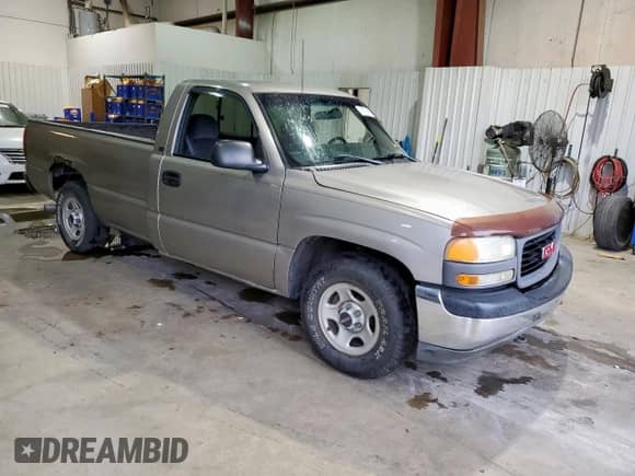 2001 GMC Sierra 1500 SL with VIN 1GTEC14W91Z225726, listed as a Copart auction lot 70775565 with 217,081 mi miles and Salvage title. Bid and sale history available at DreamBid. Image 4.