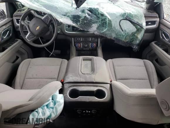 2023 Chevrolet Suburban LS с VIN 1GNSCBKD5PR231520, выставлен на аукционе Copart как лот 52026425 с пробегом 20 068 миль миль и Списание • Salvage title. История ставок и продаж доступна на DreamBid. Изображение 8.