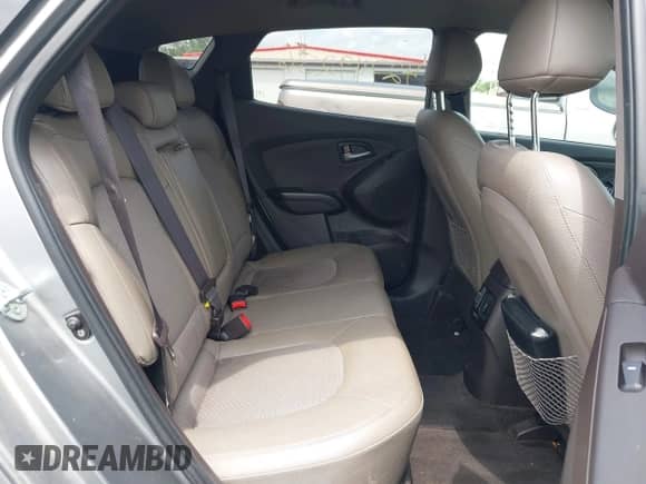 2014 Hyundai Tucson Limited z VIN KM8JU3AG9EU924731, wystawiony jako IAAI lot #42749256 z przebiegiem 151 007 mil mil oraz . Historia ofert i sprzedaży dostępna na DreamBid. Obrazek 8.