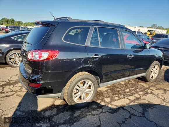 2010 Hyundai Santa Fe Limited с VIN 5NMSKDAGXAH379970, выставлен на аукционе Copart как лот 69197225 с пробегом 142 051 миль миль и Списание • Salvage title. История ставок и продаж доступна на DreamBid. Изображение 3.