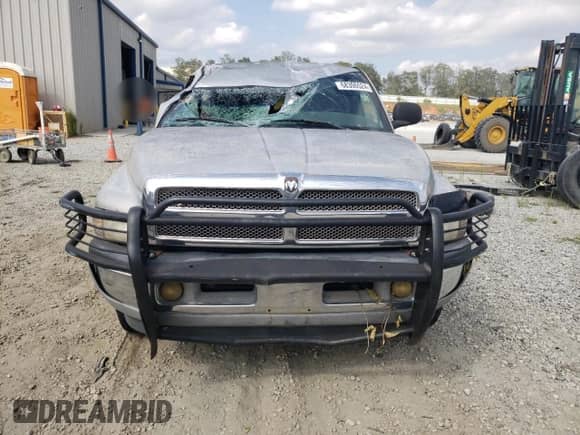 2000 Dodge 1500 с VIN 3B7HC13Z1YG138356, выставлен на аукционе Copart как лот 68306524 с пробегом 171 481 миль миль и Списание • Salvage title. История ставок и продаж доступна на DreamBid. Изображение 5.