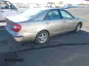 2002 Toyota Camry LE with VIN JTDBE32K120127837, listed as a IAAI auction lot 43414026 with 143,201 mi miles and . Bid and sale history available at DreamBid. Image 4.