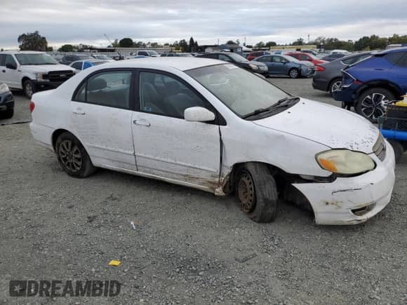 2004 Toyota Corolla S with VIN 1NXBR32E04Z321362, listed as a Copart auction lot 84808715 with 177,499 mi miles and Salvage title. Bid and sale history available at DreamBid. Image 4.