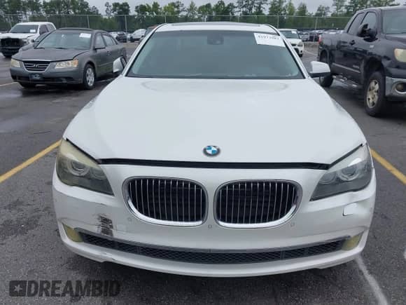 2011 BMW 7 Series 750i xDrive with VIN WBAKC6C52BC394674, listed as a IAAI auction lot 42973981 with 114,659 mi miles and . Bid and sale history available at DreamBid. Image 6.