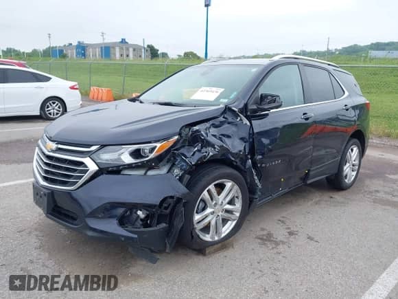 2020 Chevrolet Equinox Premier with VIN 3GNAXPEX5LS558347, listed as a IAAI auction lot 42369436 with 60,507 mi miles and . Bid and sale history available at DreamBid. Image 2.