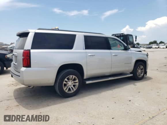 2017 Chevrolet Suburban LS with VIN 1GNSCGKC5HR315424, listed as a Copart auction lot 61951785 with 246,505 mi miles and Salvage title. Bid and sale history available at DreamBid. Image 3.