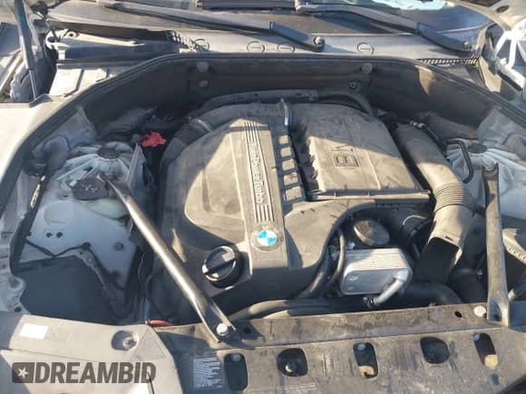 2015 BMW 5 Series 535i Gran Turismo z VIN WBA5M2C51FD872215, wystawiony jako IAAI lot #41787558 z przebiegiem 96 768 mil mil oraz . Historia ofert i sprzedaży dostępna na DreamBid. Obrazek 6.