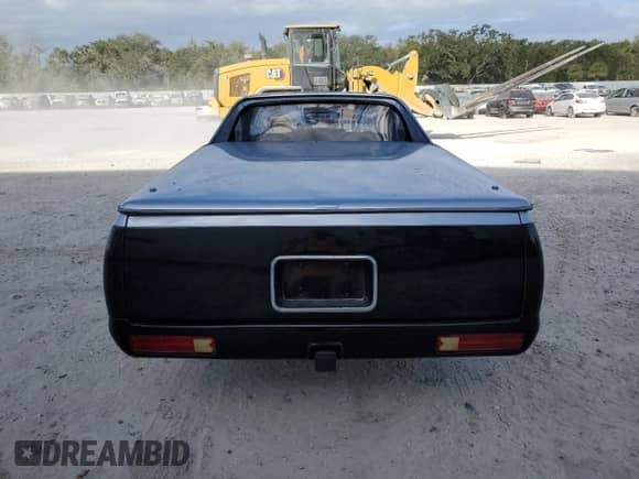 1986 Chevrolet El Camino SS with VIN 3GCCW80H7GS909081, listed as a Copart auction lot 76185614 with 66,212 mi miles and Salvage title. Bid and sale history available at DreamBid. Image 6.