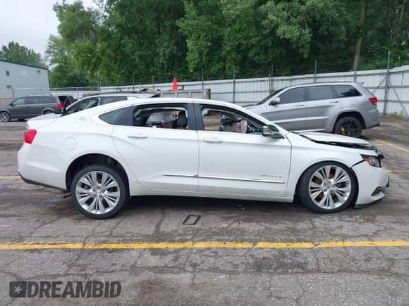 2020 Chevrolet Impala Premier with VIN 1G1105S38LU104850, listed as a IAAI auction lot 42600793 with Not provided miles and . Bid and sale history available at DreamBid. Image 13.