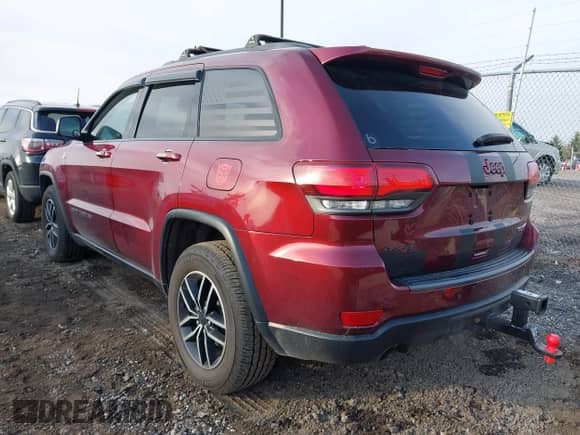 2019 Jeep Grand Cherokee Trailhawk z VIN 1C4RJFLG3KC590342, wystawiony jako IAAI lot #42022307 z przebiegiem 59 538 mil mil oraz . Historia ofert i sprzedaży dostępna na DreamBid. Obrazek 3.