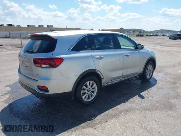 2019 Kia Sorento LX with VIN 5XYPG4A30KG582267, listed as a IAAI auction lot 43033776 with 148,881 mi miles and . Bid and sale history available at DreamBid. Image 4.