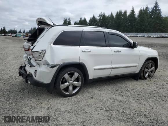 2013 Jeep Grand Cherokee Limited с VIN 1C4RJFBT2DC600277, выставлен на аукционе Copart как лот 80575905 с пробегом 123 885 миль миль и Списание • Salvage title. История ставок и продаж доступна на DreamBid. Изображение 3.