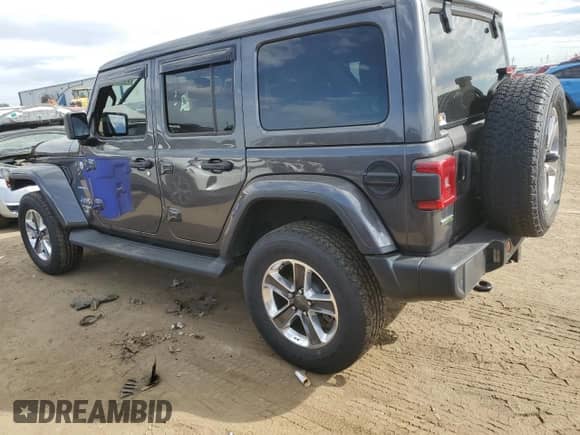2021 Jeep Wrangler Unlimited Sahara High Altitude with VIN 1C4HJXEM5MW599937, listed as a Copart auction lot 71797814 with Not provided miles and Salvage title. Bid and sale history available at DreamBid. Image 2.